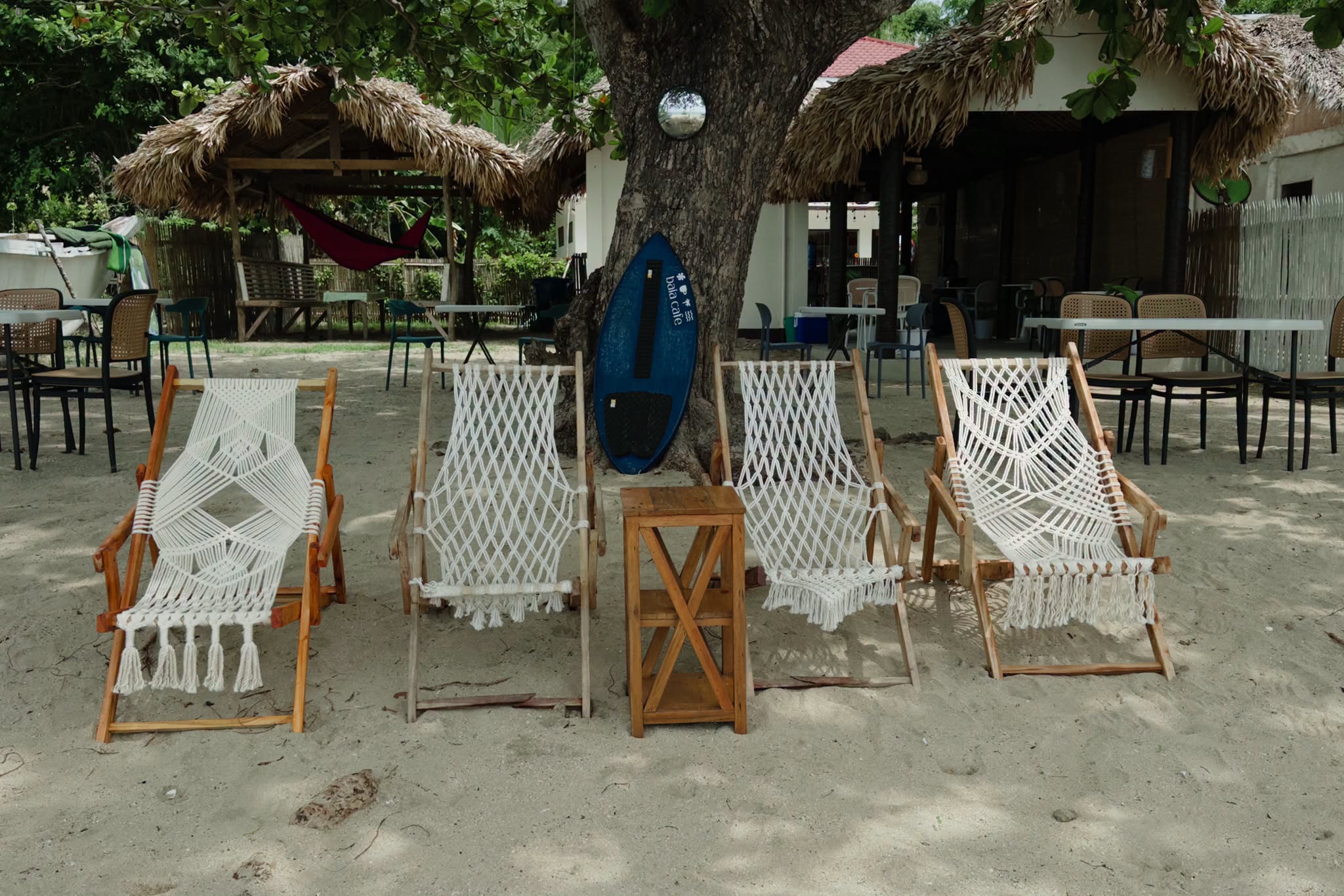 BAIA beachfront lounge chairs on sand