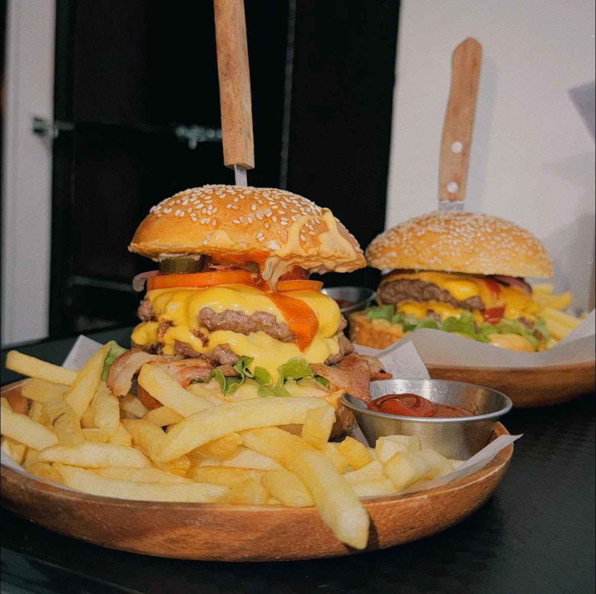 BAIA Double Smash Burger with melted cheese and fries